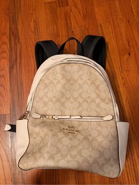coach backpack addison Court In Signature Canvas Crossgrain leather Inside zip cell phone and multifunction pockets Inside laptop sleeve Zip closure recycled polyester lining Top handle with 3 drop Outside zip pocket Luggage sleeve Adjustable shoulder straps 11 3/4 (L) x 15 3/4 (H) x 4 3/4 (W) Style No. COACH Outlet Aiden Backpack In